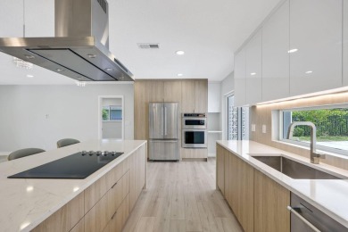 Welcome to this fully reimagined South Florida masterpiece! This on Lakeview Golf Club in Florida - for sale on GolfHomes.com, golf home, golf lot