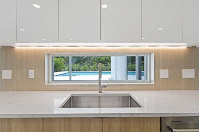 Welcome to this fully reimagined South Florida masterpiece! This on Lakeview Golf Club in Florida - for sale on GolfHomes.com, golf home, golf lot