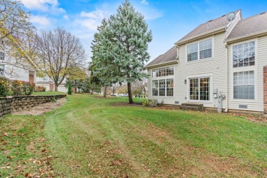 Welcome to this exceptional two-story end unit, perfectly on Poplar Creek Country Club in Illinois - for sale on GolfHomes.com, golf home, golf lot