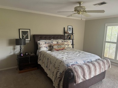 LIVE THE COUNTRY CLUB LIFESTYLE! Nestled adjacent to the on Pine Bluff Country Club in Arkansas - for sale on GolfHomes.com, golf home, golf lot