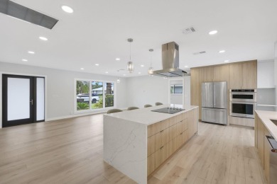 Welcome to this fully reimagined South Florida masterpiece! This on Lakeview Golf Club in Florida - for sale on GolfHomes.com, golf home, golf lot