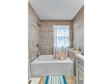 Come fall in love with this well maintained ranch-style home! on Topeka Country Club in Kansas - for sale on GolfHomes.com, golf home, golf lot