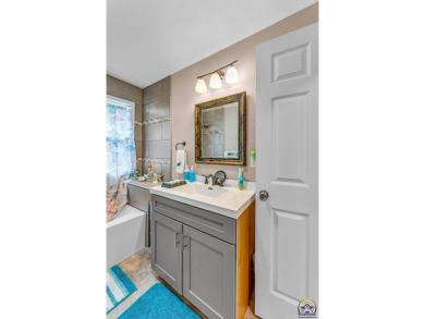 Come fall in love with this well maintained ranch-style home! on Topeka Country Club in Kansas - for sale on GolfHomes.com, golf home, golf lot