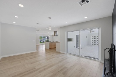 Welcome to this fully reimagined South Florida masterpiece! This on Lakeview Golf Club in Florida - for sale on GolfHomes.com, golf home, golf lot