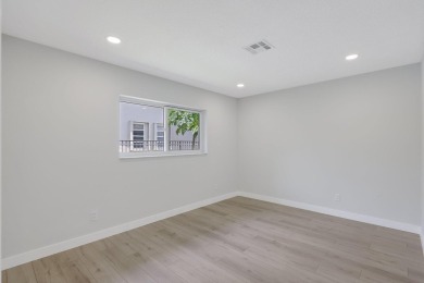 Welcome to this fully reimagined South Florida masterpiece! This on Lakeview Golf Club in Florida - for sale on GolfHomes.com, golf home, golf lot