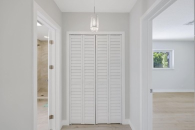 Welcome to this fully reimagined South Florida masterpiece! This on Lakeview Golf Club in Florida - for sale on GolfHomes.com, golf home, golf lot
