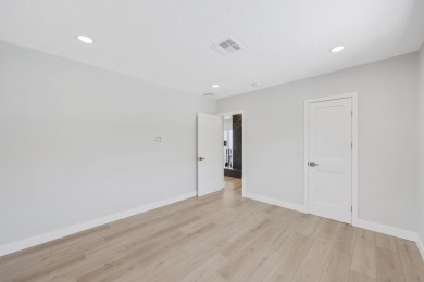 Welcome to this fully reimagined South Florida masterpiece! This on Lakeview Golf Club in Florida - for sale on GolfHomes.com, golf home, golf lot