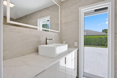 Welcome to this fully reimagined South Florida masterpiece! This on Lakeview Golf Club in Florida - for sale on GolfHomes.com, golf home, golf lot