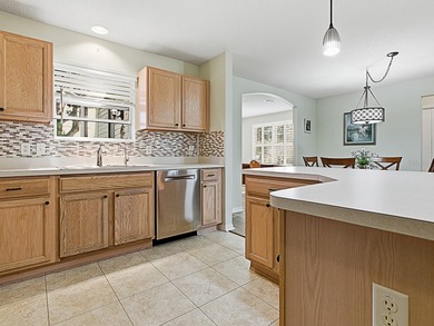 Charming Split Plan Home Near Mulberry Grove---BOND PAID!!-- on Nancy Lopez Legacy Golf and Country Club in Florida - for sale on GolfHomes.com, golf home, golf lot