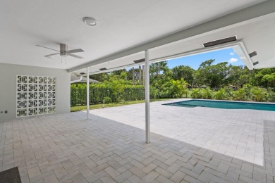 Welcome to this fully reimagined South Florida masterpiece! This on Lakeview Golf Club in Florida - for sale on GolfHomes.com, golf home, golf lot
