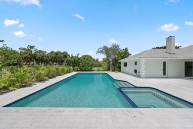 Welcome to this fully reimagined South Florida masterpiece! This on Lakeview Golf Club in Florida - for sale on GolfHomes.com, golf home, golf lot