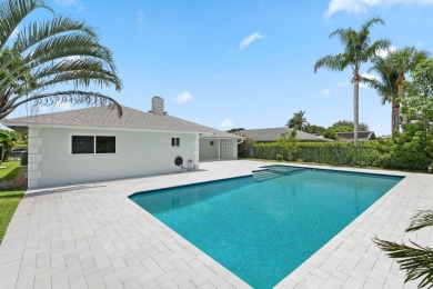 Welcome to this fully reimagined South Florida masterpiece! This on Lakeview Golf Club in Florida - for sale on GolfHomes.com, golf home, golf lot