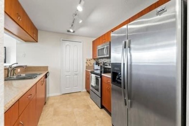 TAKE A LOOK AT THIS SHARP & CONTEMPORARY 3 BEDROOM 2 1/2 BATH on Gator Trace Golf and Country Club in Florida - for sale on GolfHomes.com, golf home, golf lot