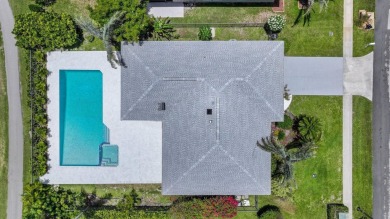 Welcome to this fully reimagined South Florida masterpiece! This on Lakeview Golf Club in Florida - for sale on GolfHomes.com, golf home, golf lot