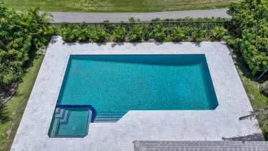 Welcome to this fully reimagined South Florida masterpiece! This on Lakeview Golf Club in Florida - for sale on GolfHomes.com, golf home, golf lot