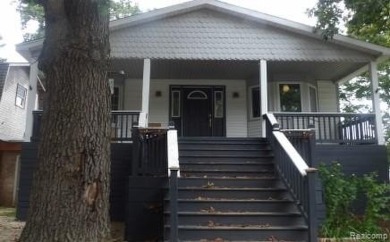 Two story home near lake and golf course. Property has addition on Hankerd Hills Golf Course in Michigan - for sale on GolfHomes.com, golf home, golf lot