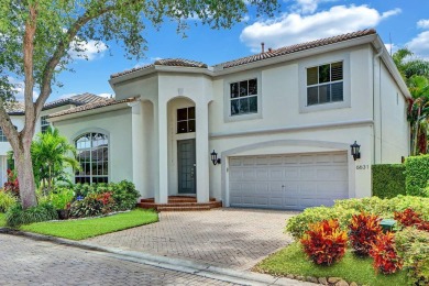 Light & open, this lovely 2-story home of 3 bedrooms & 2 1/2 on Woodfield Country Club in Florida - for sale on GolfHomes.com, golf home, golf lot