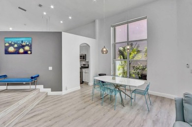 Light & open, this lovely 2-story home of 3 bedrooms & 2 1/2 on Woodfield Country Club in Florida - for sale on GolfHomes.com, golf home, golf lot