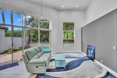 Light & open, this lovely 2-story home of 3 bedrooms & 2 1/2 on Woodfield Country Club in Florida - for sale on GolfHomes.com, golf home, golf lot