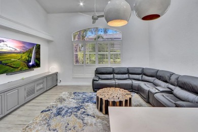 Light & open, this lovely 2-story home of 3 bedrooms & 2 1/2 on Woodfield Country Club in Florida - for sale on GolfHomes.com, golf home, golf lot
