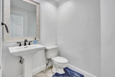 Light & open, this lovely 2-story home of 3 bedrooms & 2 1/2 on Woodfield Country Club in Florida - for sale on GolfHomes.com, golf home, golf lot