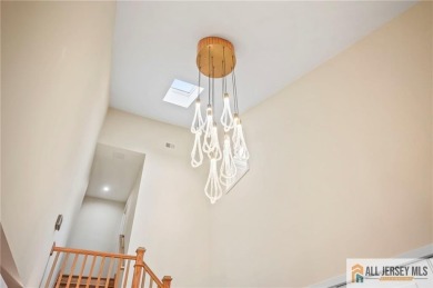 Originally built in 1970, this home has beencompletely on Metuchen Golf and Country Club in New Jersey - for sale on GolfHomes.com, golf home, golf lot