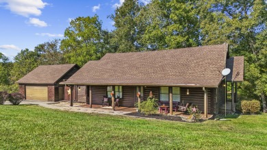 Sitting in the scenic Woodlawn Estates community along Lake on Peninsula Golf Resort in Kentucky - for sale on GolfHomes.com, golf home, golf lot