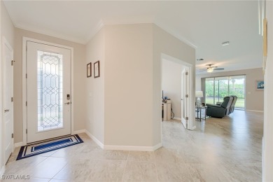 Upon entering the home, one is immediately struck by the on Pelican Preserve Golf Club in Florida - for sale on GolfHomes.com, golf home, golf lot