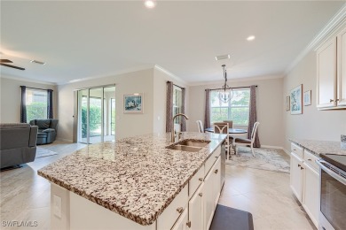 Upon entering the home, one is immediately struck by the on Pelican Preserve Golf Club in Florida - for sale on GolfHomes.com, golf home, golf lot