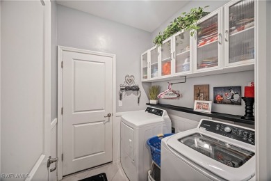 This almost new villa is located in the popular gated community on Sabal Trace Golf and Country Club in Florida - for sale on GolfHomes.com, golf home, golf lot