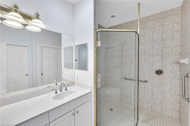 Gracefully positioned on the second floor with sweeping on Hammock Bay in Florida - for sale on GolfHomes.com, golf home, golf lot