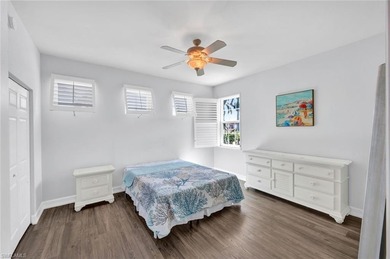 Gracefully positioned on the second floor with sweeping on Hammock Bay in Florida - for sale on GolfHomes.com, golf home, golf lot