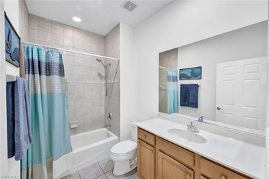 Gracefully positioned on the second floor with sweeping on Hammock Bay in Florida - for sale on GolfHomes.com, golf home, golf lot