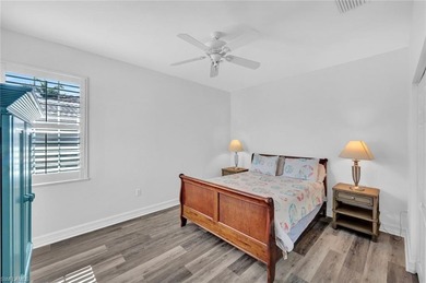 Gracefully positioned on the second floor with sweeping on Hammock Bay in Florida - for sale on GolfHomes.com, golf home, golf lot