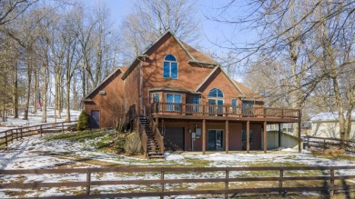 This custom built home stands tall next to the soaring trees on on Heron Creek Golf Club in Indiana - for sale on GolfHomes.com, golf home, golf lot