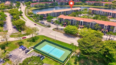 Stunning Lakefront 2 Bed, 2 Bath Condo in Century Village on Flamingo Lakes Country Club in Florida - for sale on GolfHomes.com, golf home, golf lot