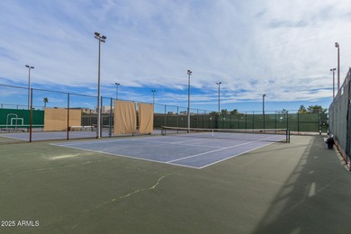 Welcome to this inviting Sun City home offering comfort on Sun City Lakes West and East in Arizona - for sale on GolfHomes.com, golf home, golf lot