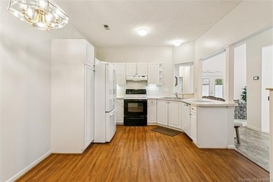 This beautifully maintained end-unit townhome in the desirable on Kiln Creek Golf and Country Club in Virginia - for sale on GolfHomes.com, golf home, golf lot