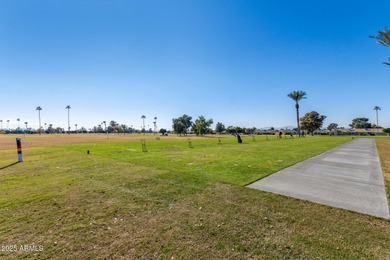 Welcome to this inviting Sun City home offering comfort on Sun City Lakes West and East in Arizona - for sale on GolfHomes.com, golf home, golf lot