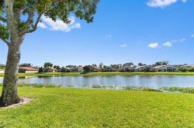 Welcome to this stunning lake-view home in the serene community on Westchester Golf and Country Club in Florida - for sale on GolfHomes.com, golf home, golf lot