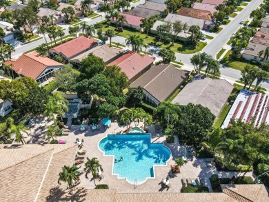 Welcome to this stunning lake-view home in the serene community on Westchester Golf and Country Club in Florida - for sale on GolfHomes.com, golf home, golf lot