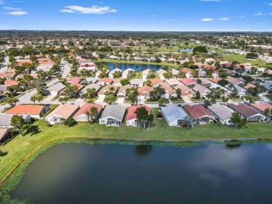 Welcome to this stunning lake-view home in the serene community on Westchester Golf and Country Club in Florida - for sale on GolfHomes.com, golf home, golf lot