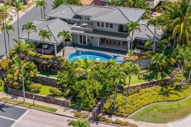 Set prominently on an elevated corner lot within the exclusive on Wailea Golf Club in Hawaii - for sale on GolfHomes.com, golf home, golf lot