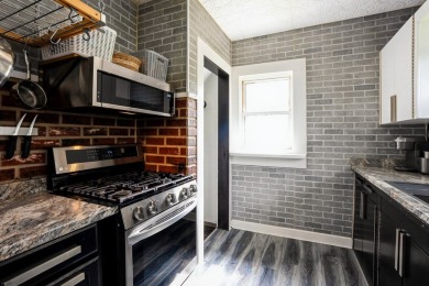 This charming South Side bungalow is full of character and some on Wakonda Club in Iowa - for sale on GolfHomes.com, golf home, golf lot