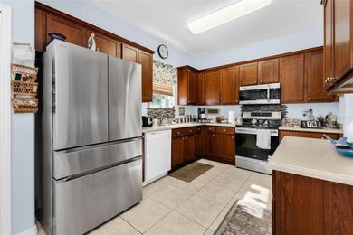 STUNNIG SHEFFIELD with HIGH ceilings in the gated golf on Kings Gate Golf Club in Florida - for sale on GolfHomes.com, golf home, golf lot