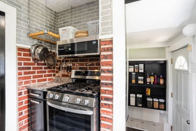 This charming South Side bungalow is full of character and some on Wakonda Club in Iowa - for sale on GolfHomes.com, golf home, golf lot