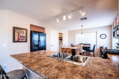 Welcome to this charming 3-bed, 2.5-bath home w/versatile loft on The Golf Club At Johnson Ranch in Arizona - for sale on GolfHomes.com, golf home, golf lot