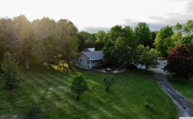 This stunning 3.7-acre in-town acreage offers the perfect blend on Oak Hills Golf Course in Iowa - for sale on GolfHomes.com, golf home, golf lot