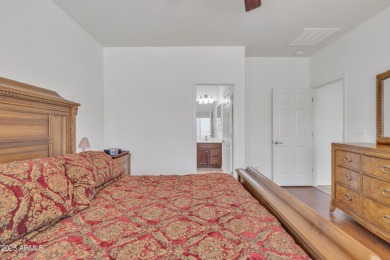Step into style and comfort with this beautifully upgraded home on Poston Butte Golf Club in Arizona - for sale on GolfHomes.com, golf home, golf lot