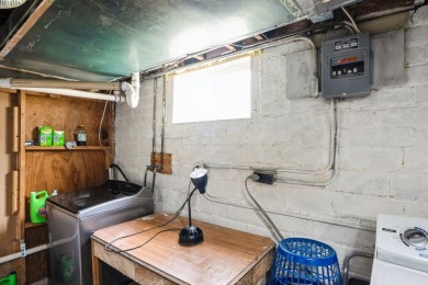 This charming South Side bungalow is full of character and some on Wakonda Club in Iowa - for sale on GolfHomes.com, golf home, golf lot